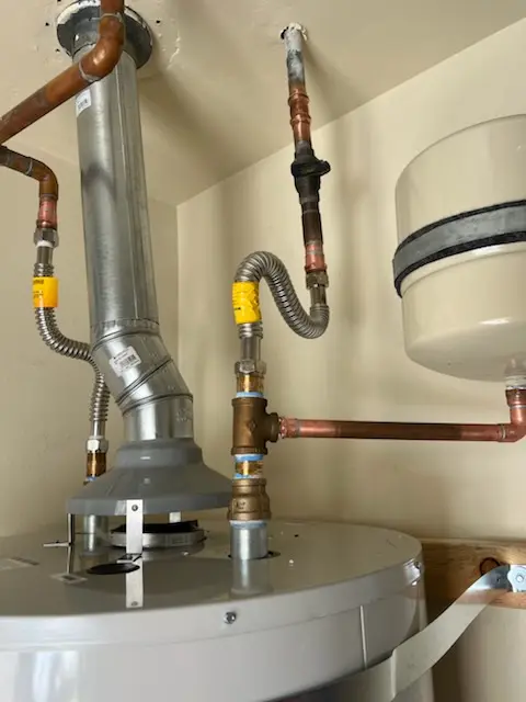 Water heater installation and plumbing repair in Smithflat